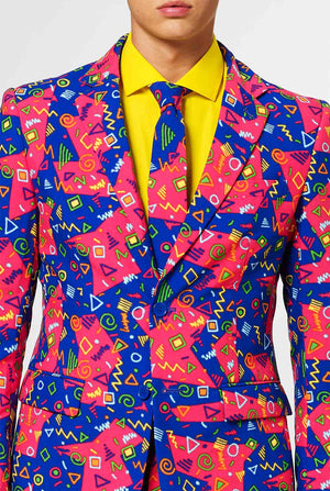Funky pink and blue men's suit with abstract icons worn by man