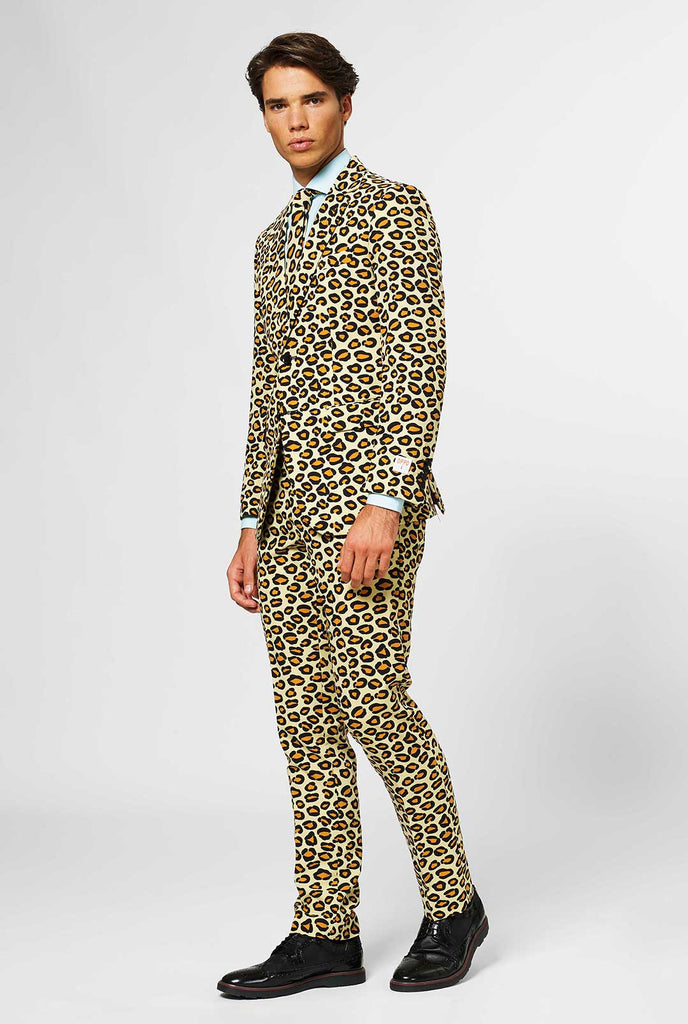 Man wearing men's suit with panther print