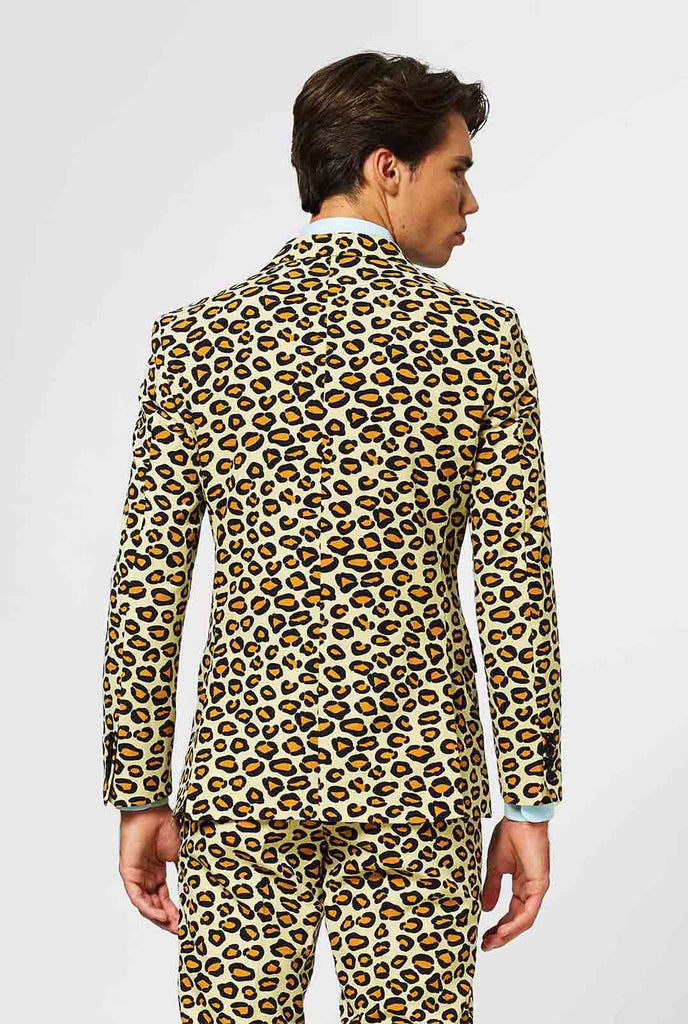 Man wearing men's suit with panther print