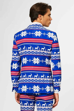 Man wearing blue Christmas suit with Nordic themed print