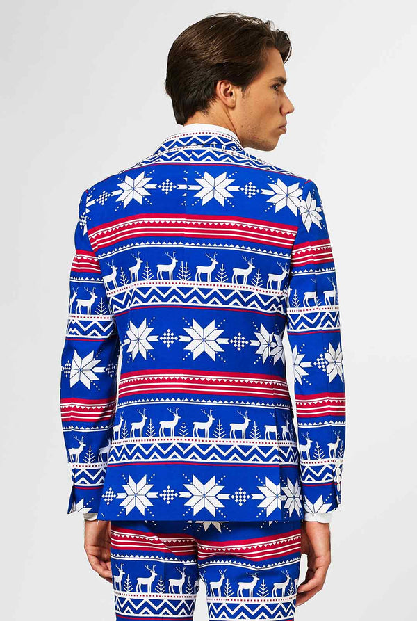 Man wearing blue Christmas suit with Nordic themed print