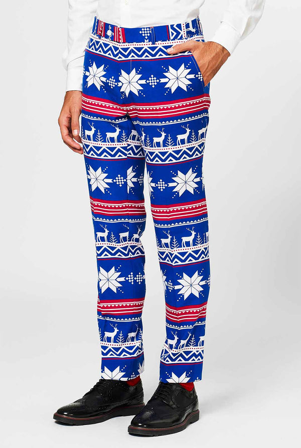 Man wearing blue Christmas suit with Nordic themed print