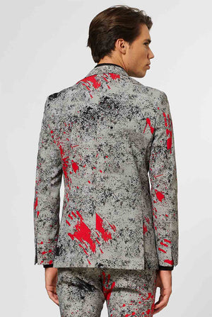 Man wearing grey Halloween men's suit with blood stains