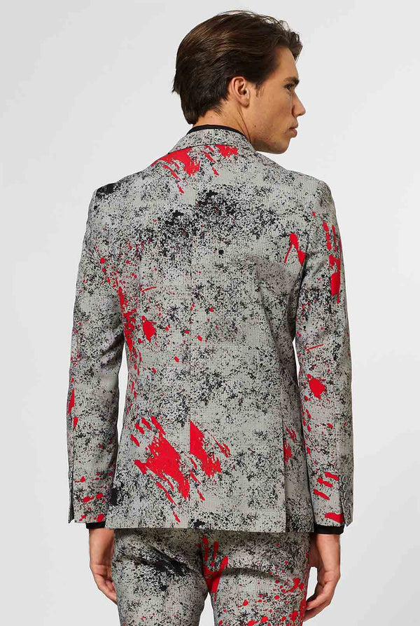 Man wearing grey Halloween men's suit with blood stains