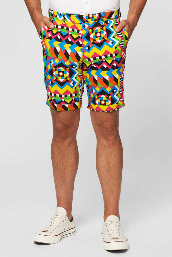 Man wearing colorful summer suit, consisting of short, jacket and tie