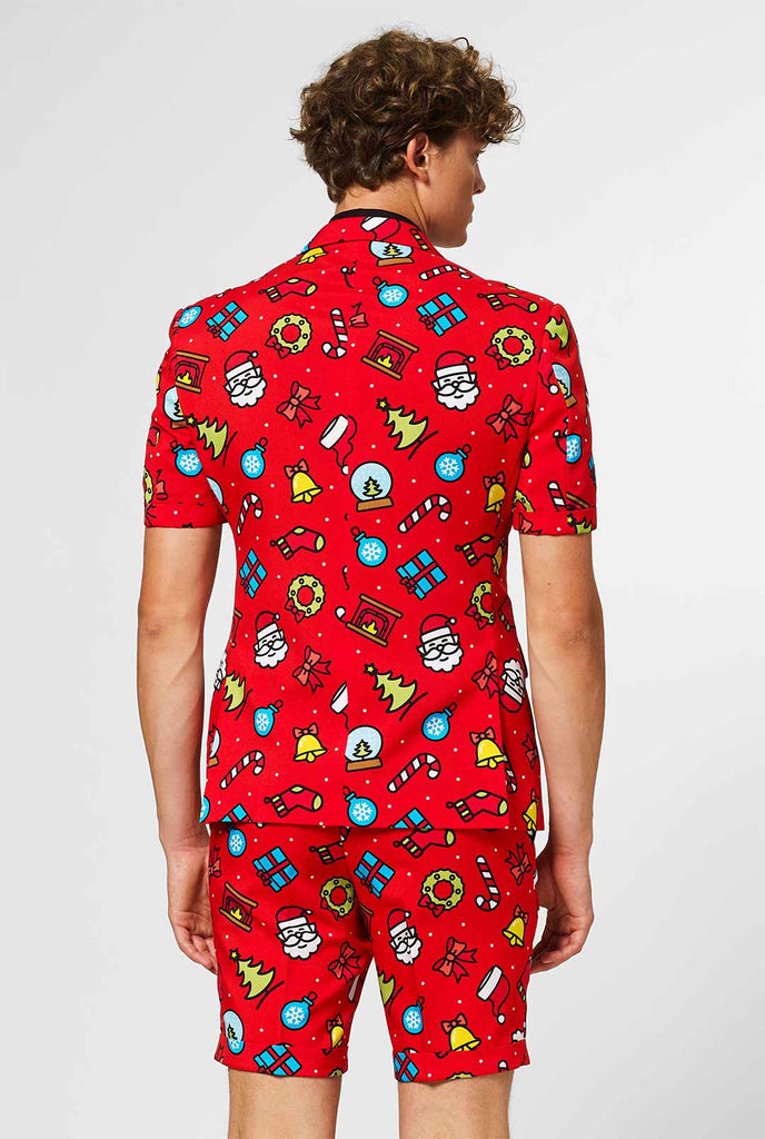 Man wearing red Christmas summer suit with Christmas print