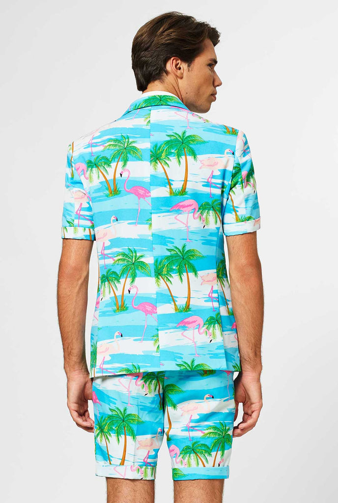 Man wearing summer suit with tropical flamingo print