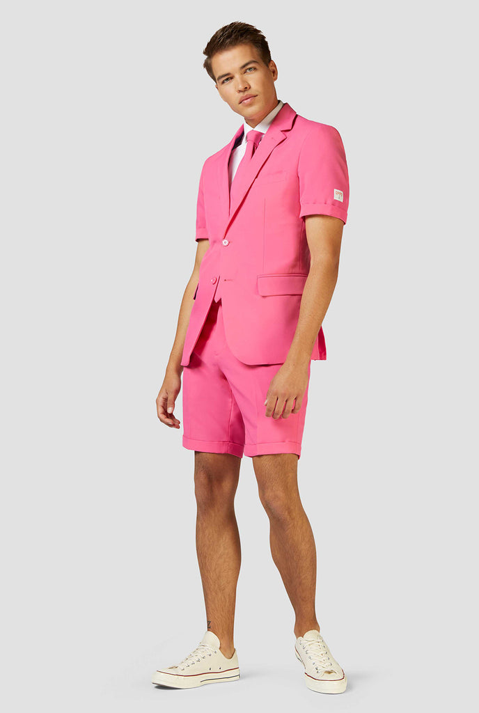 Man wearing pink summer suit