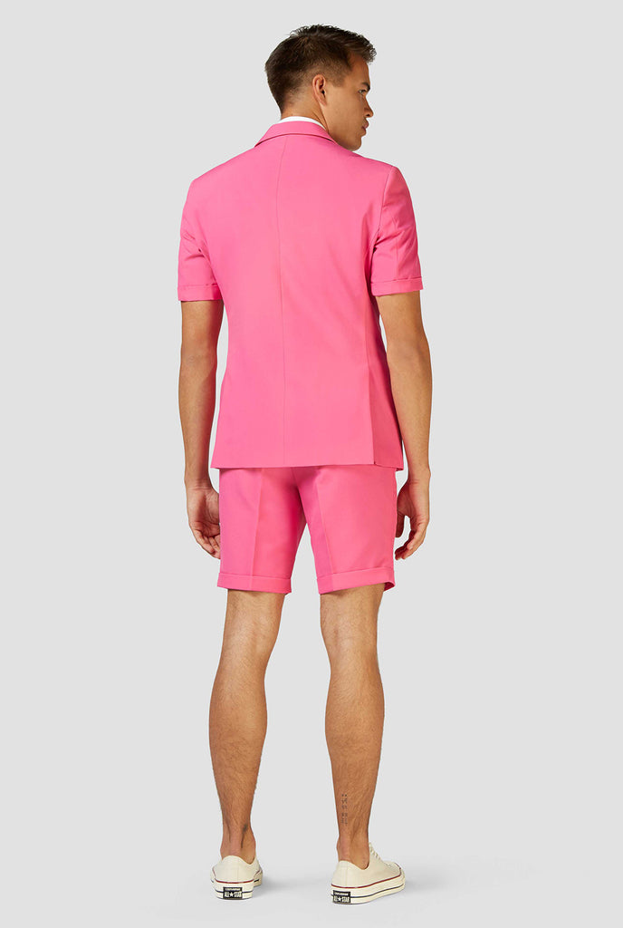 Man wearing pink summer suit
