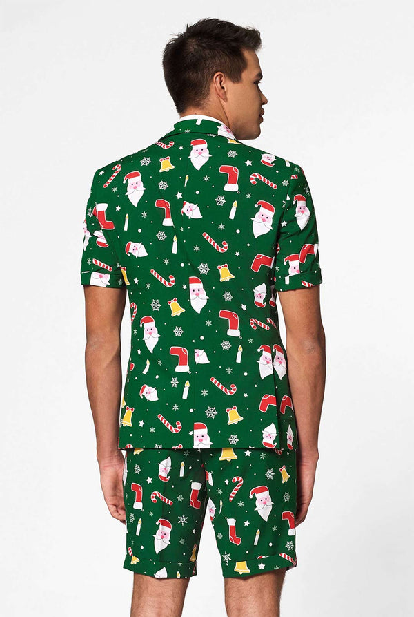 Man wearing green Christmas summer suit, consisting of shorts, jacket and tie
