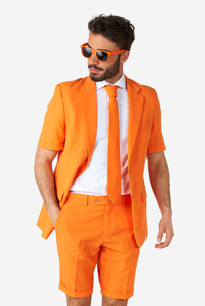Man wearing orange summer suit