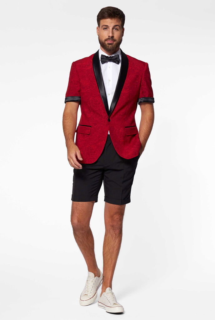 Man wearing red summer tuxedo with flower print