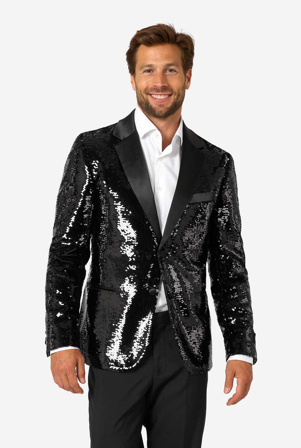 Man wearing a black sequin blazer over a white shirt on a white background