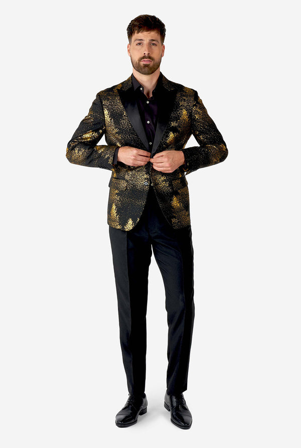 Man wearing black blazer with golden Christmas tree print