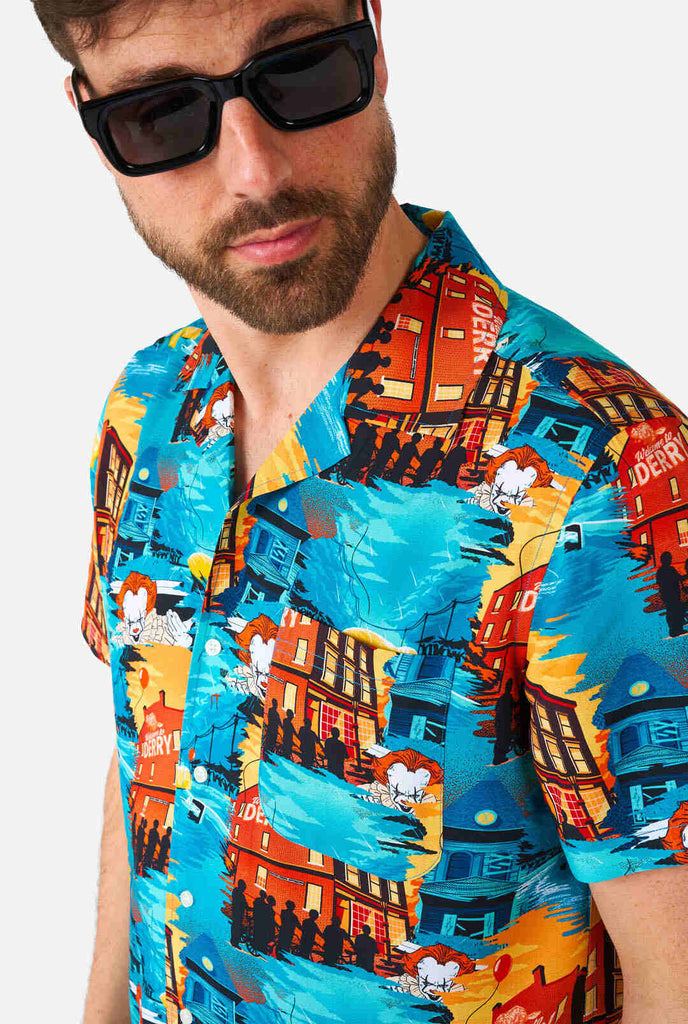 Man wearing halloween shirt with IT print, close up