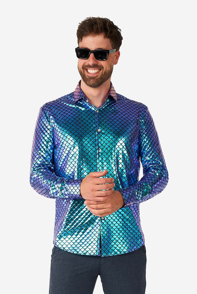 Man wearing blue fishscale print shirt