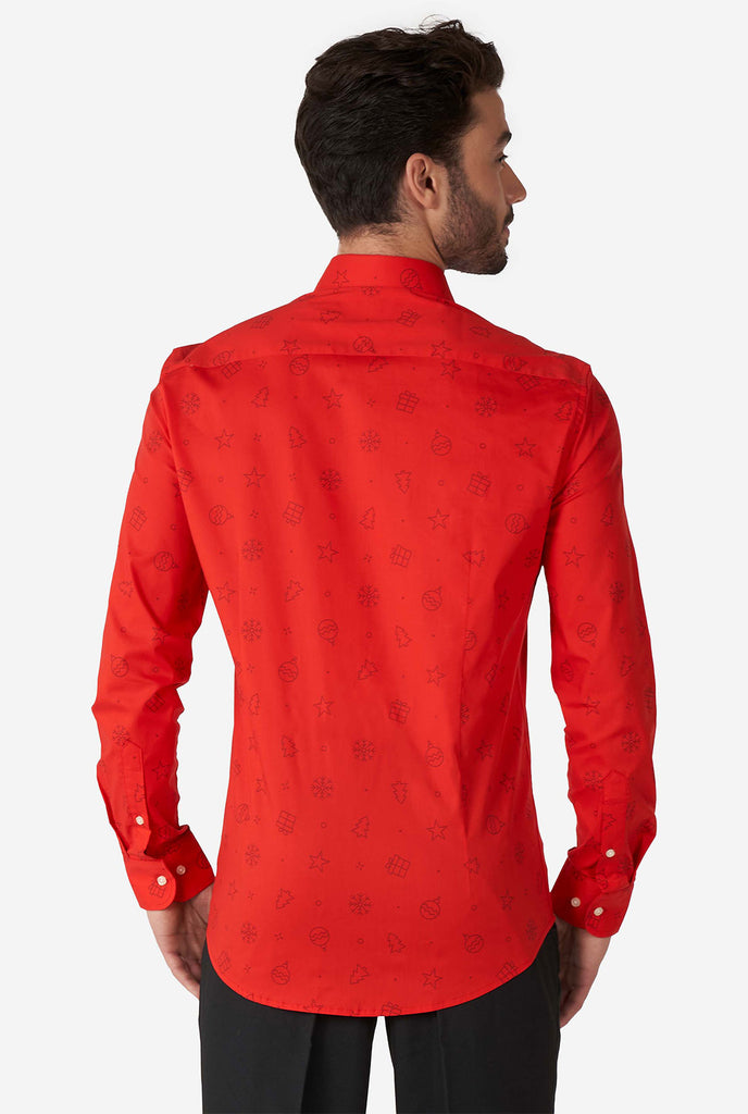 Man wearing red dress shirt with Christmas icons
