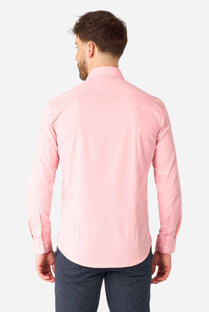 Man wearing soft pink dress shirt