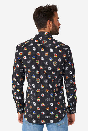 Man wearing black dress shirt with Super Mario bad guys icons