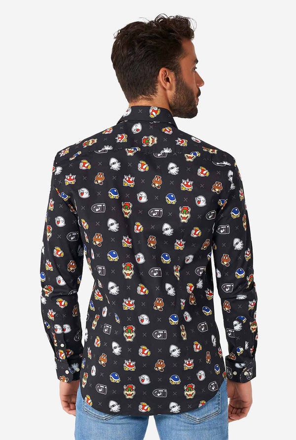 Man wearing black dress shirt with Super Mario bad guys icons