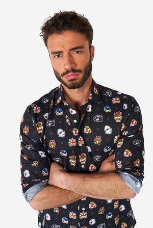 Man wearing black dress shirt with Super Mario bad guys icons