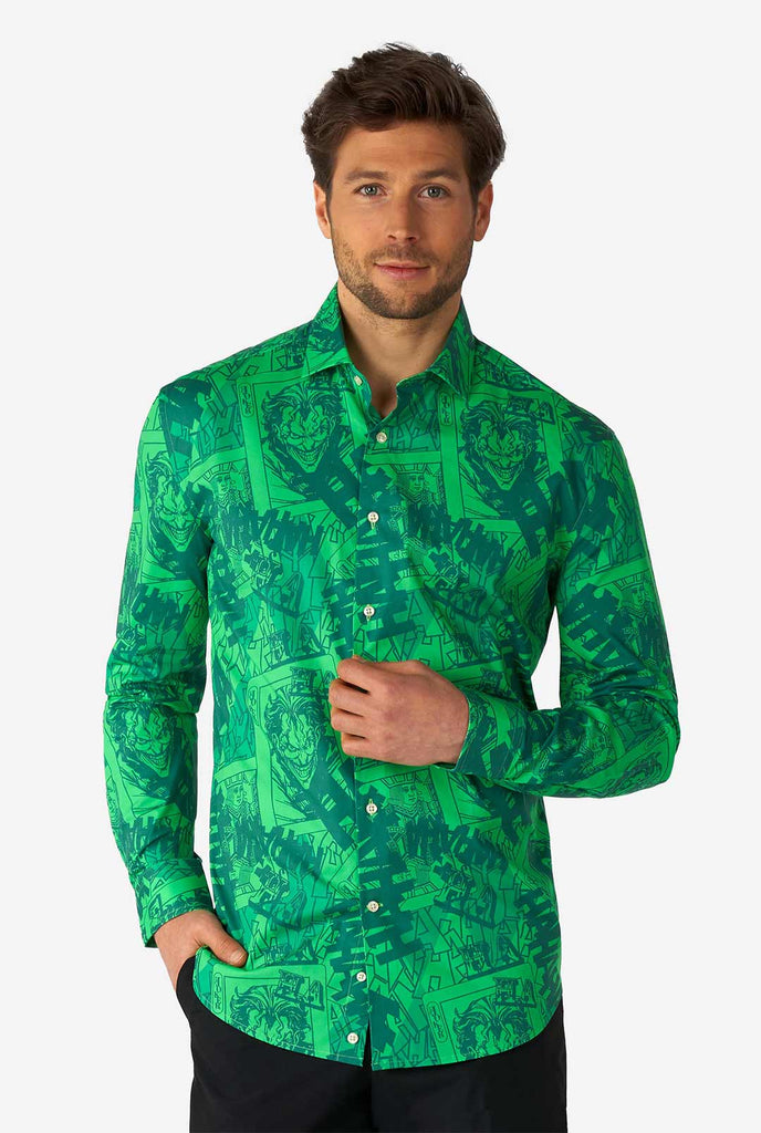 Man wearing green dress shirt with The Joker print