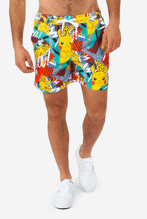 Man wearing colorful summer shorts and shirt with Pikachu Pokemon print