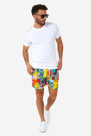 Man wearing colorful summer shorts and shirt with Pikachu Pokemon print
