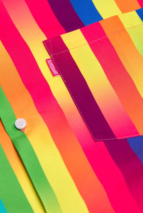 Image of a vertically striped rainbow-colored summer set, consisting of shirt and shorts. Close up of the chest. 