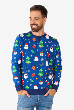 Man wearing blue Christmas sweater with Christmas icons