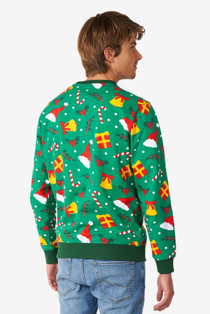 Man wearing green Christmas sweater with Christmas icons