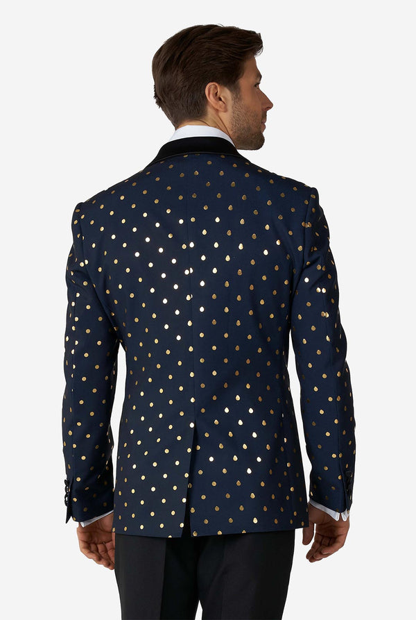 Man wearing blue tuxedo with golden dots