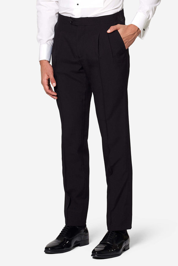 Man wearing tuxedo with jaguar print jacket