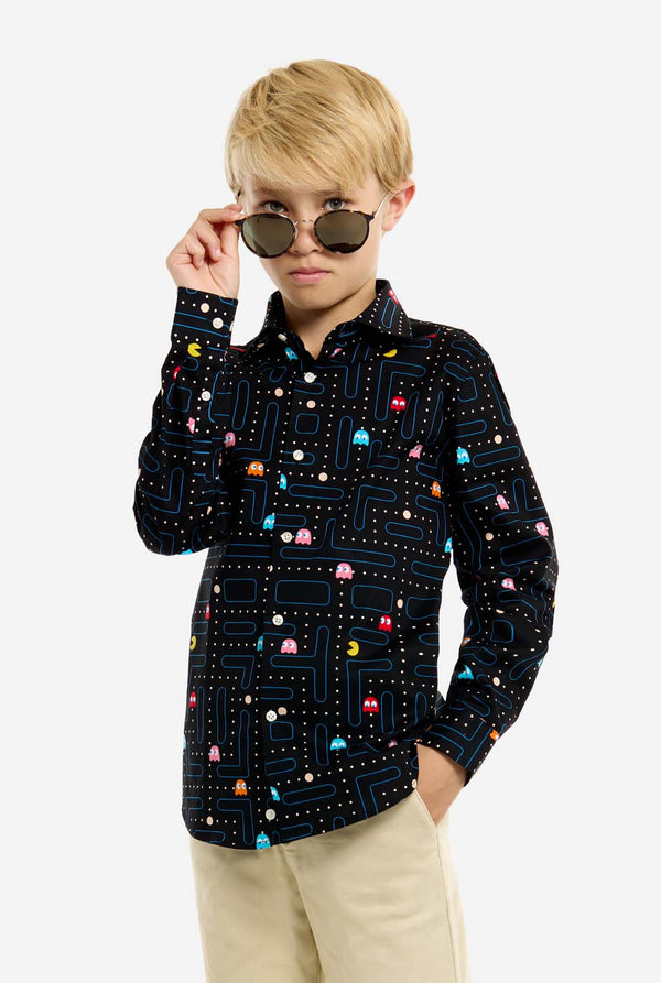 Person wearing a black shirt with colorful patterns on a white background