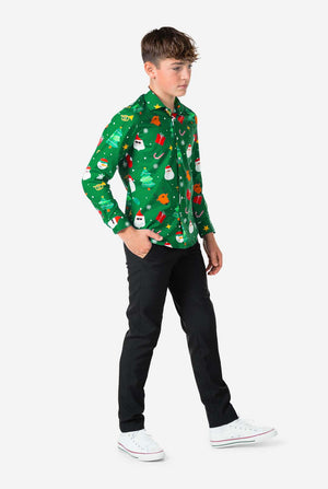 Person wearing a festive green shirt with Christmas-themed patterns on a white background