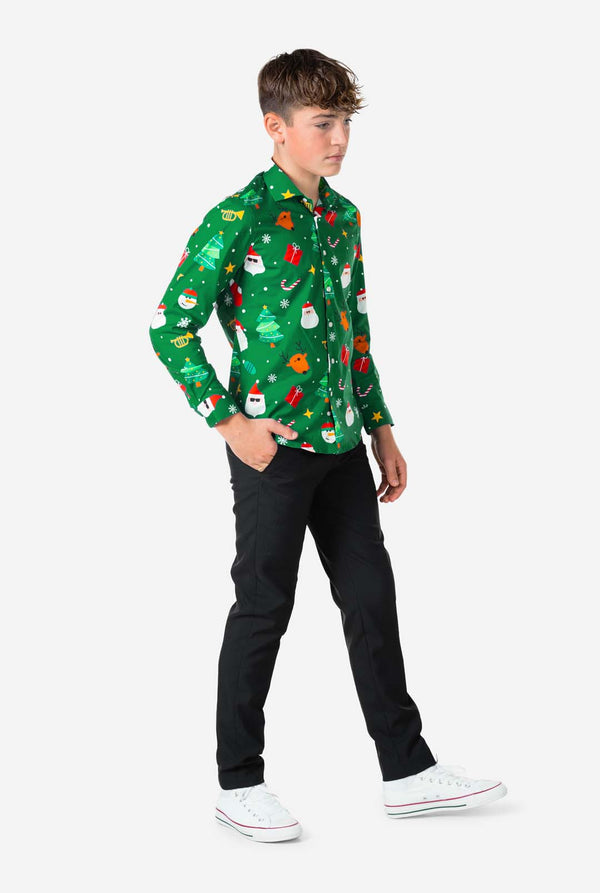 Person wearing a festive green shirt with Christmas-themed patterns on a white background