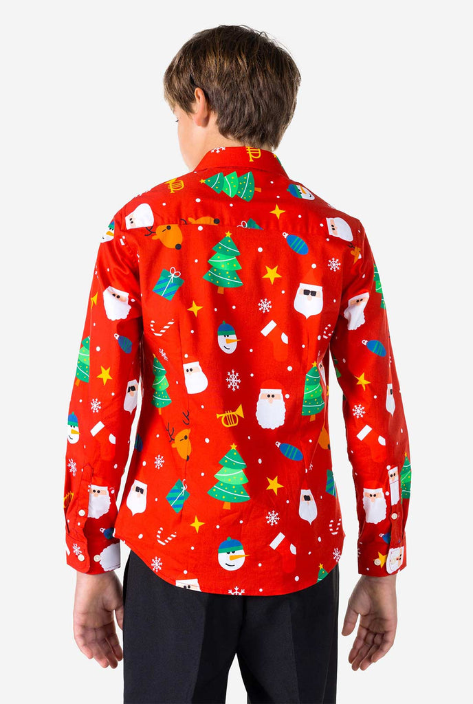 Teen wearing red dress shirt with Christmas print