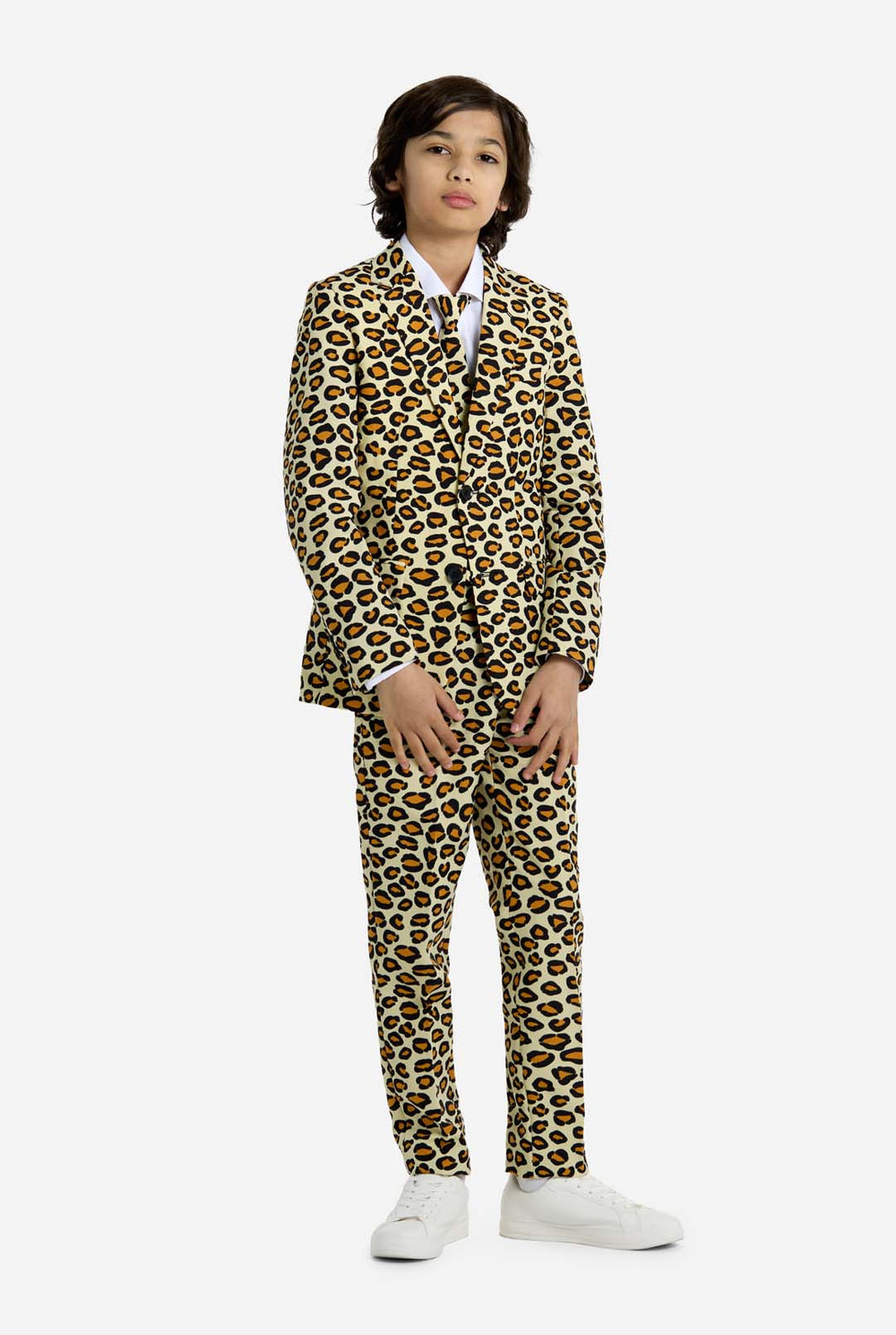 Child wearing a leopard print suit on a white background
