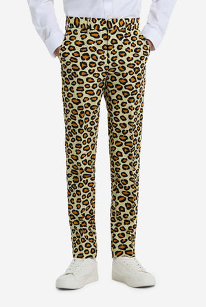 Leopard print pants worn with a white shirt and white sneakers on a white background