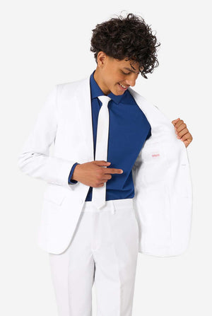 Kid wearing a white lab coat over a blue shirt on a white background