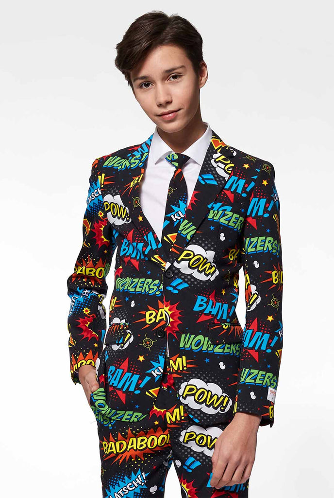 Teen wearing black suit with comic phrase print