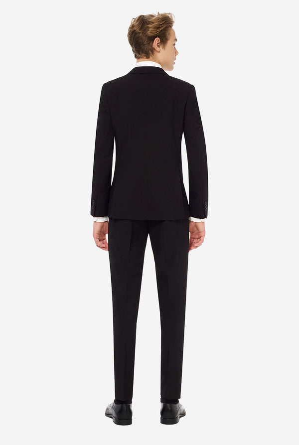 Teen wearing formal black suit