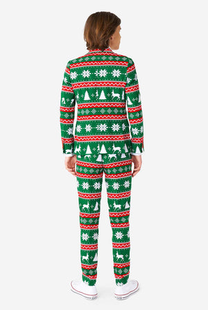 Teen wearing green formal Christmas suit