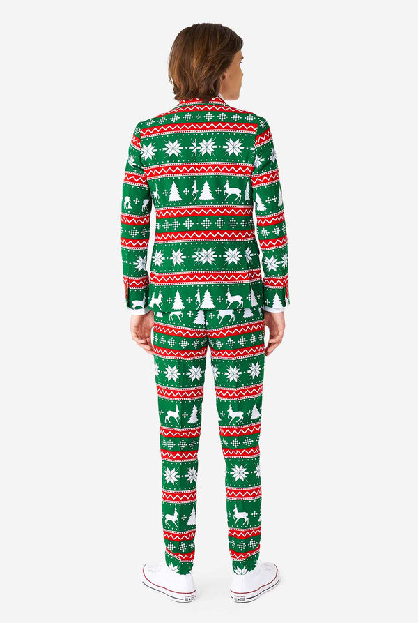 Teen wearing green formal Christmas suit