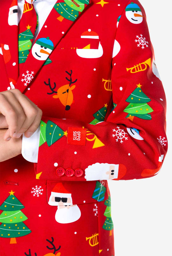 Teen wearing formal red Christmas suit