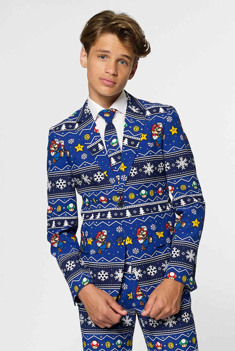 Teen wearing blue Christmas suit with Super Mario print