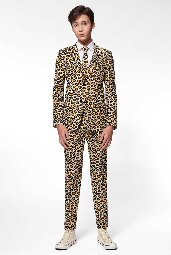 Teen wearing formal suit with panther print
