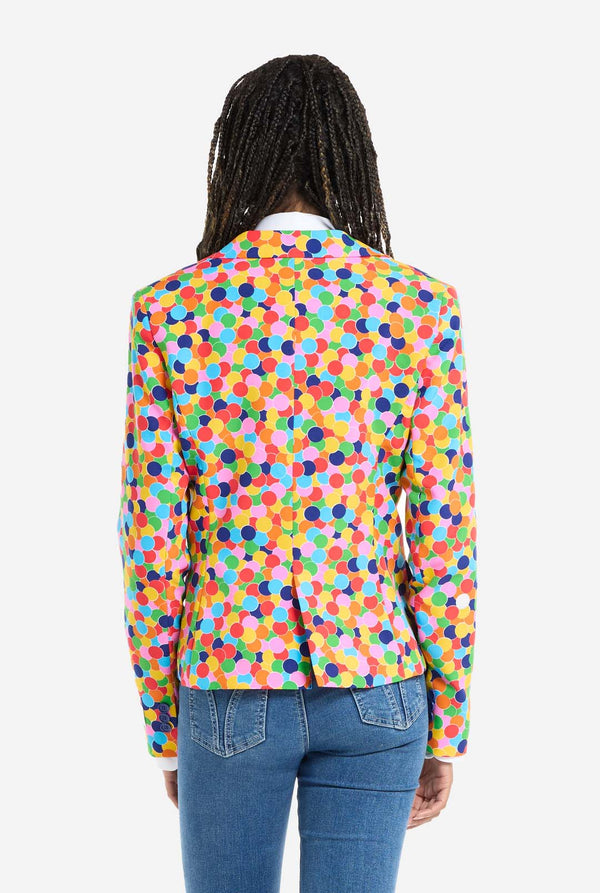 Woman wearing womens blazer with confetti print, view from the back.