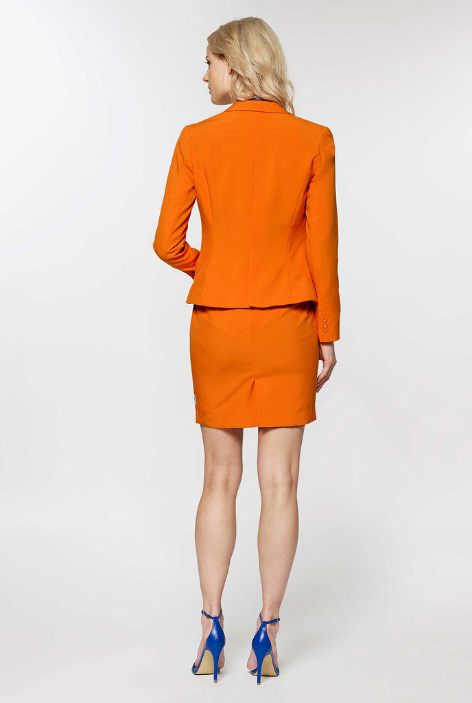 Woman wearing orange dress suit
