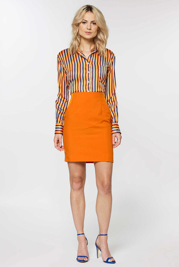 Woman wearing orange dress suit